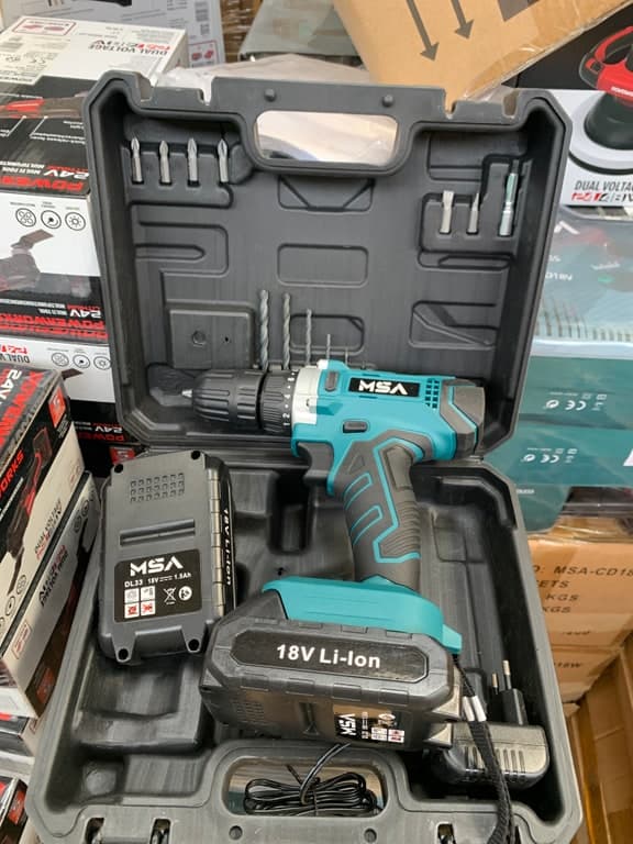 Akku-Werkzeug 19V grün-türkis (ServiceToConsumer-Linie, vermutlich Bohrschrauber)